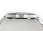 Stainless steel bezel with top emblem and crown-side details