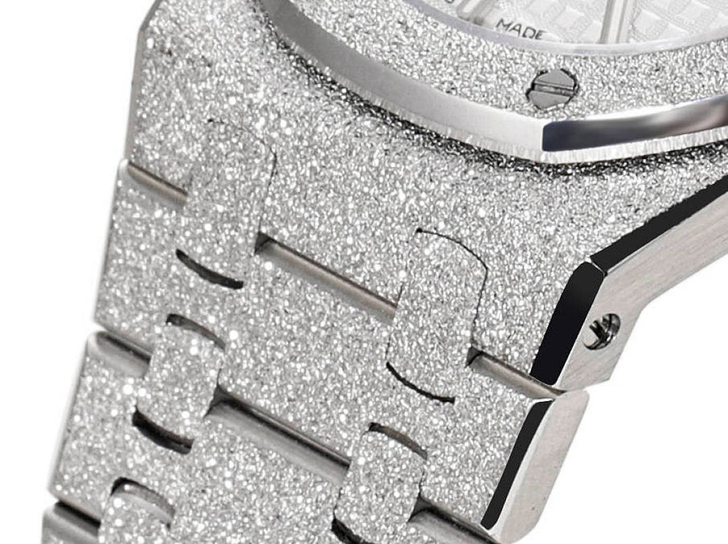 Audemars Piguet watch dial close-up with glittery bezel, hour markers and hands