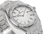 Audemars Piguet watch with white textured dial, baton markers, metal bezel