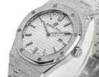 Audemars Piguet watch front with date window at 28, textured dial, steel bracelet