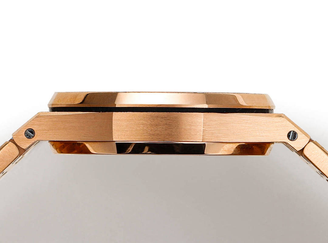 Audemars Piguet watch case side profile with rose-gold bezel and crown