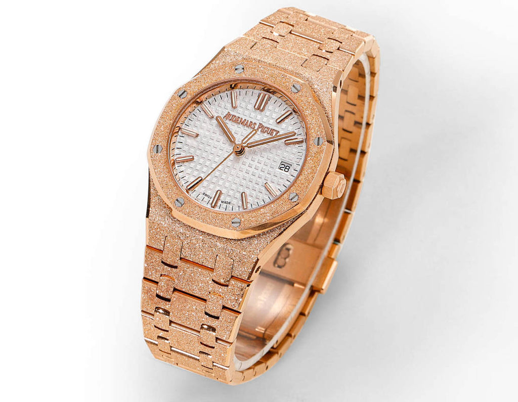 Audemars Piguet watch angled view with rose-gold bracelet and white dial