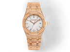 Audemars Piguet watch front view with rose-gold textured bracelet and white dial