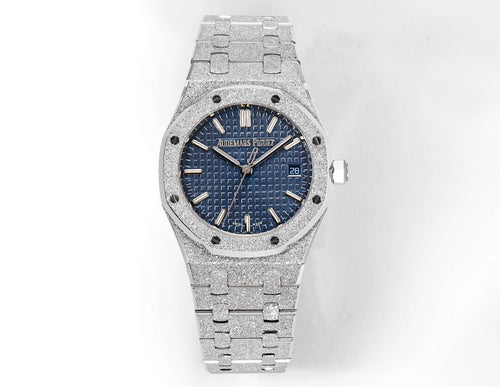 Luxury wristwatch with blue textured dial, silver steel case, and matching link bracelet.