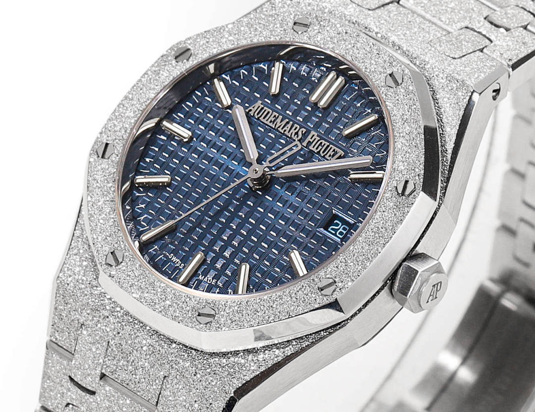 Blue textured dial wristwatch with three hands, gold-tone markers, and steel bracelet.