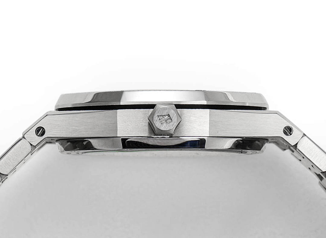 Audemars Piguet watch case top view with crown and faceted bezel