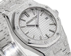 Audemars Piguet watch face with textured silver dial and baton hour markers
