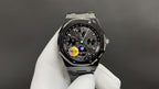 Audemars Piguet watch with black dial, chronograph subdials, and steel bracelet