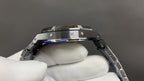 Audemars Piguet watch side profile with blue accents on bezel, steel links