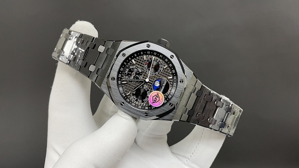 Audemars Piguet watch with open clasp and black dial, steel link bracelet