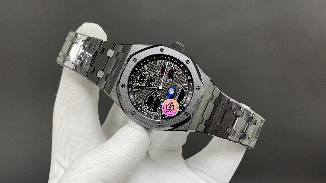 Audemars Piguet watch with open clasp and black dial, steel link bracelet