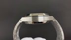 Audemars Piguet watch with brushed steel bezel and raised crown guards