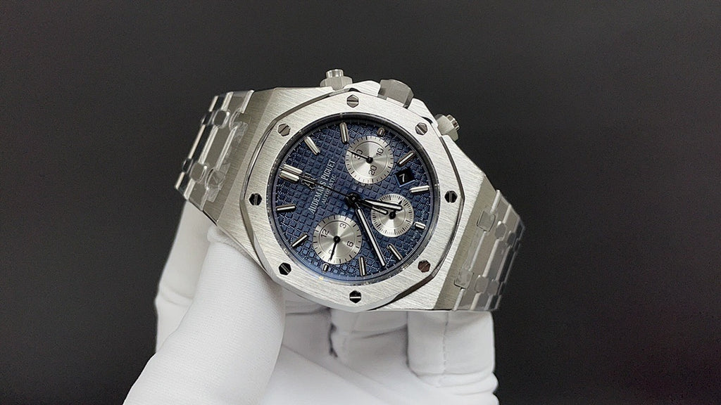 Audemars Piguet watch with blue dial and steel case, viewed at an angle