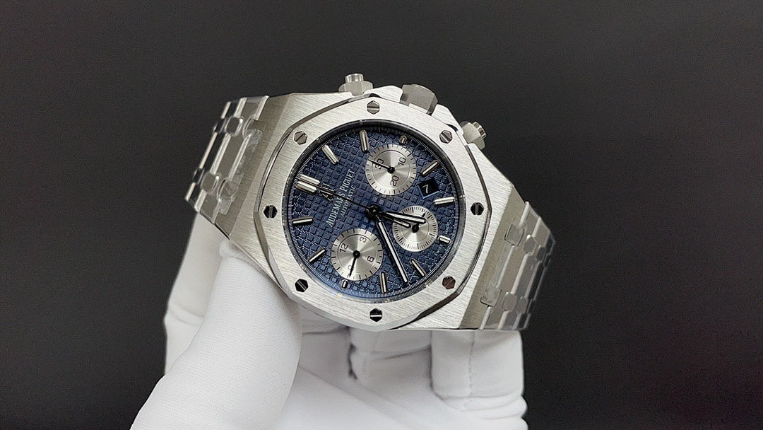 Audemars Piguet watch with blue dial and steel case, viewed at an angle