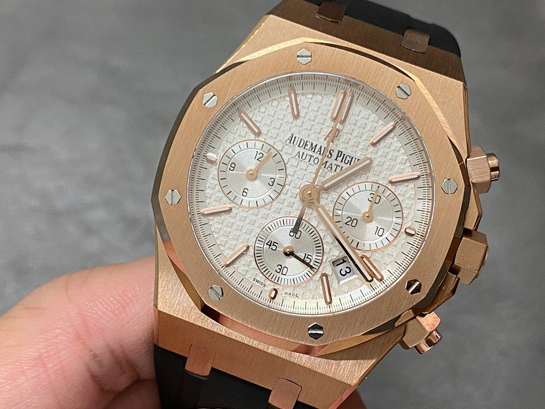 Audemars Piguet Royal Oak watch, rose gold case, silver chronograph dial, black rubber strap
