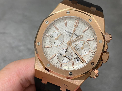 Audemars Piguet Royal Oak watch, rose gold case, silver chronograph dial, black rubber strap