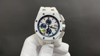 Audemars Piguet watch with white case, white strap, blue dial, multiple subdials.