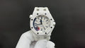 Audemars Piguet white sport watch with blue-accent dial and white rubber strap