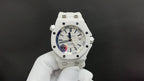 Audemars Piguet white sport watch with blue-accent dial and white rubber strap
