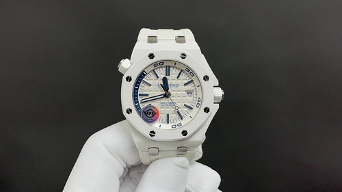 Audemars Piguet white sport watch with blue-accent dial and white rubber strap