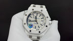 Audemars Piguet white watch with blue dial accents and metal bezel on strap
