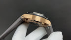 Watch caseback underside with metal plate and screw openings