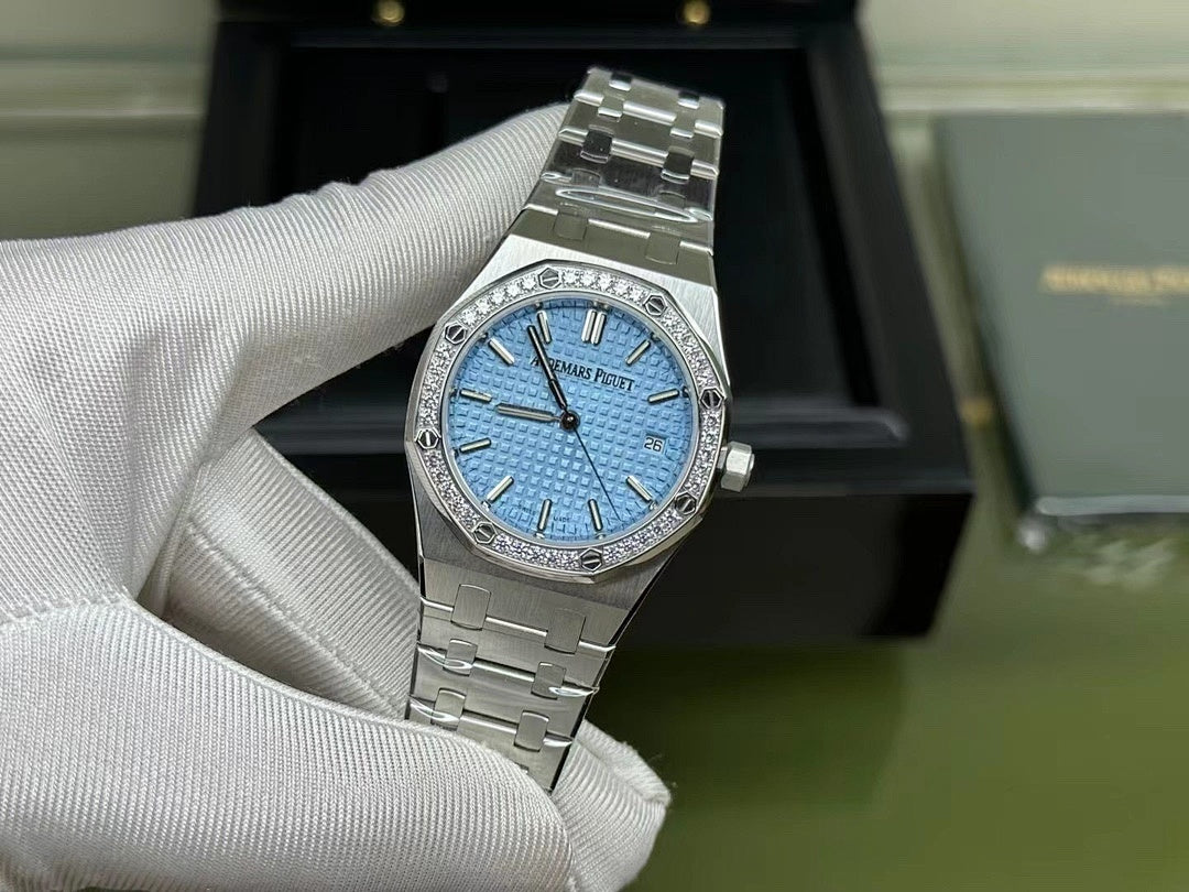 Audemars Piguet watch front view with blue dial and stainless steel bracelet