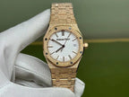Gold-tone Audemars Piguet wristwatch on bracelet with white dial and date window