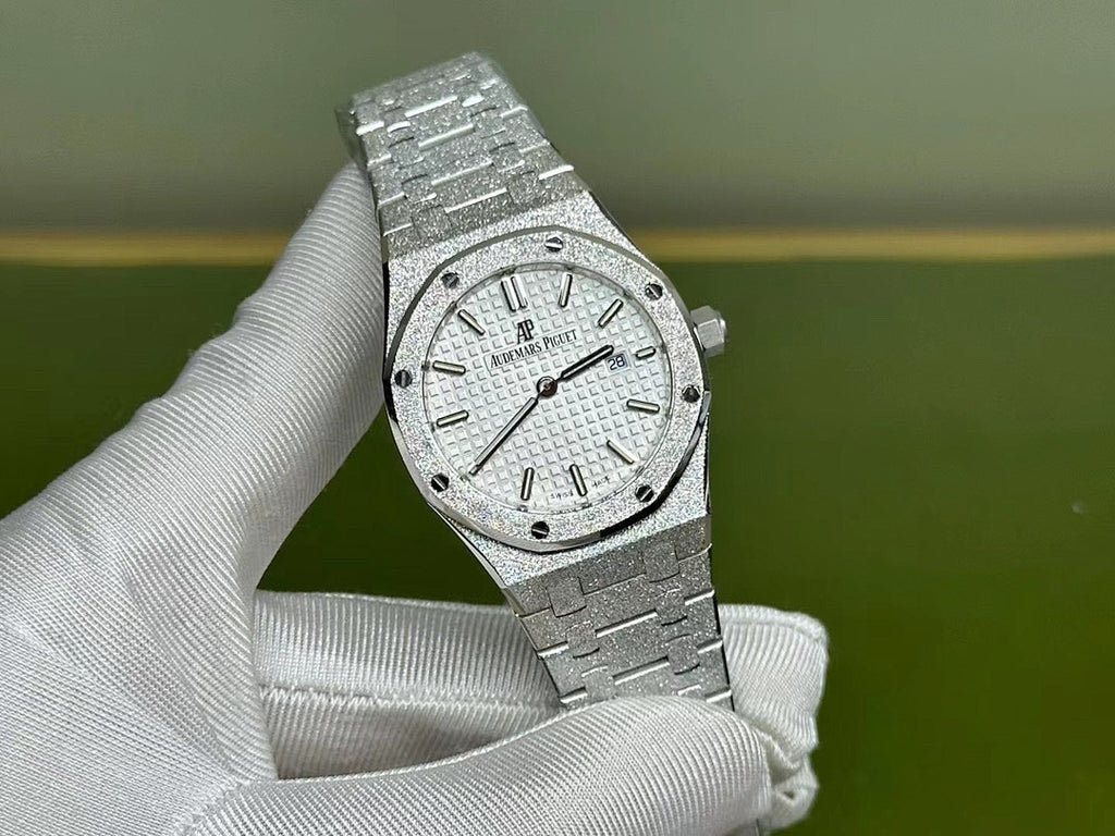 Audemars Piguet Royal Oak watch close-up with silver dial and steel bracelet, front view