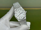 Audemars Piguet Royal Oak watch close-up with silver dial and steel bracelet, front view
