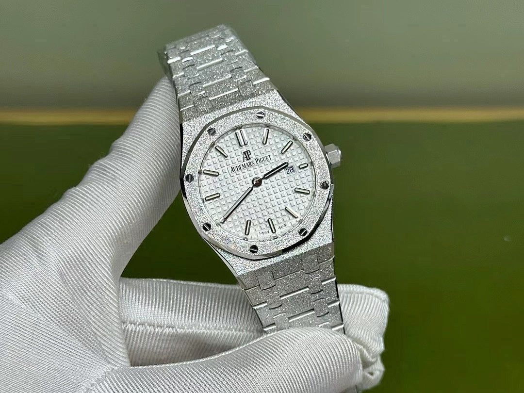 Audemars Piguet Royal Oak watch close-up with silver dial and steel bracelet, front view