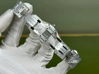 Audemars Piguet stainless steel wristwatch clasp and bracelet link detail