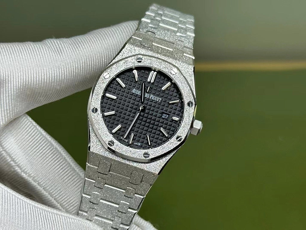 Audemars Piguet stainless steel wristwatch with black textured dial and metal bracelet