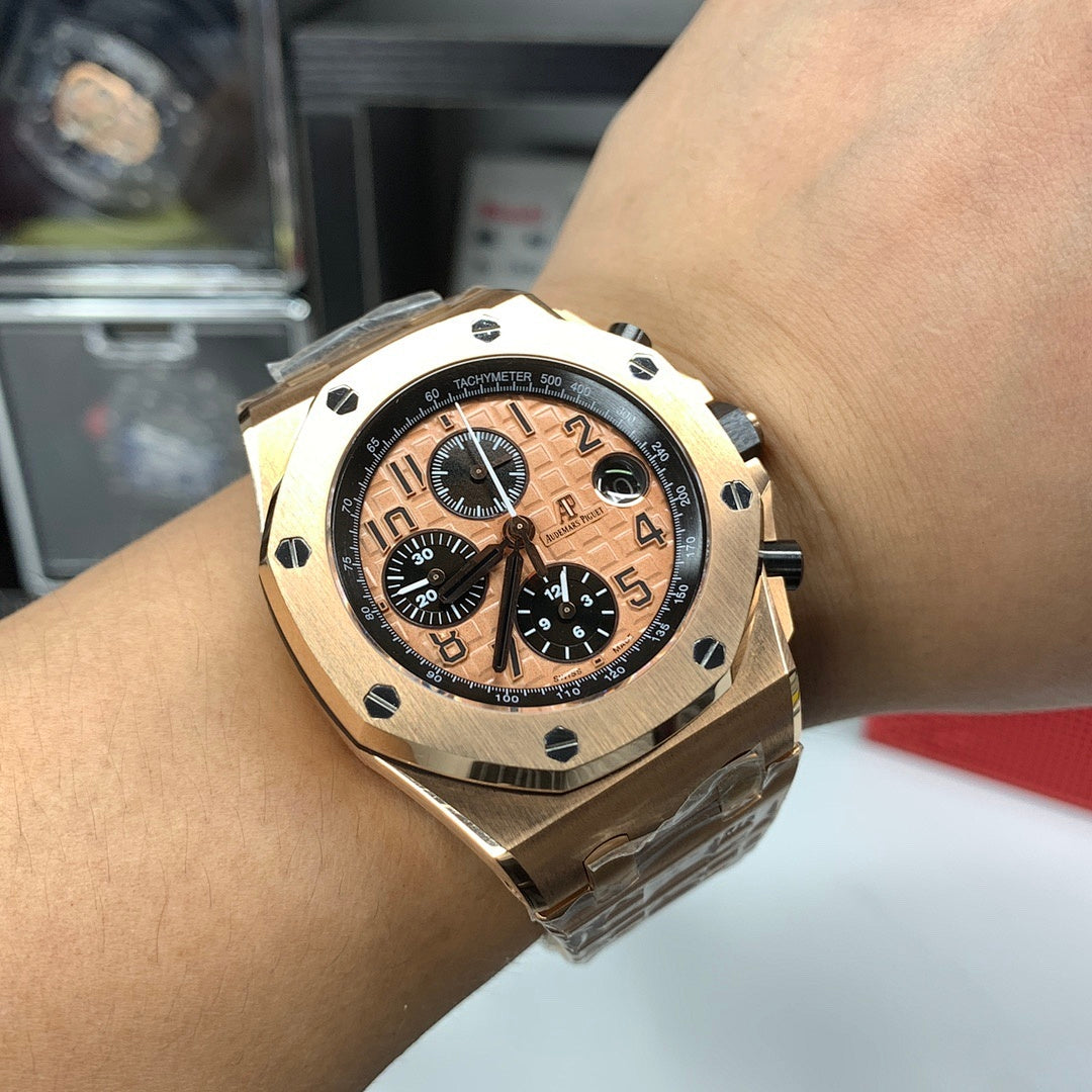 Audemars Piguet Royal Oak chronograph watch on wrist, rose-gold case, black dial