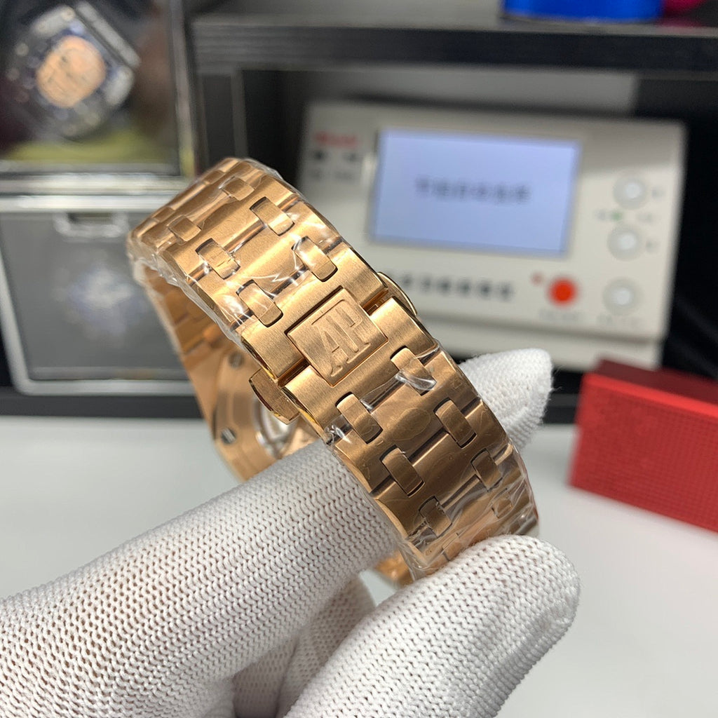 Audemars Piguet Royal Oak watch showing rose-gold bracelet links and case side