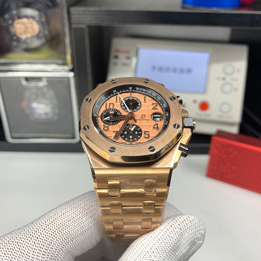 Audemars Piguet Royal Oak chronograph watch, rose-gold case, black dial on display