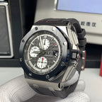Audemars Piguet chronograph watch angled view with dark dial and rubber strap