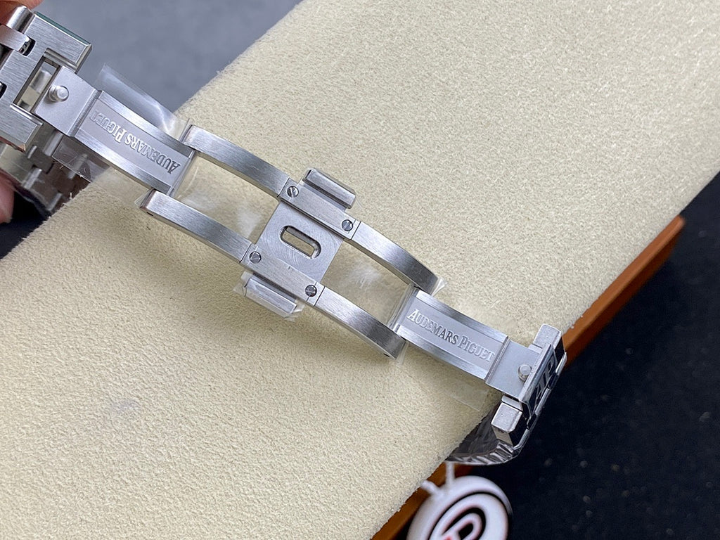 Stainless-steel watch case side with crown and metal bracelet links