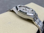 Stainless-steel watch with integrated bracelet, curved bezel, and dial details