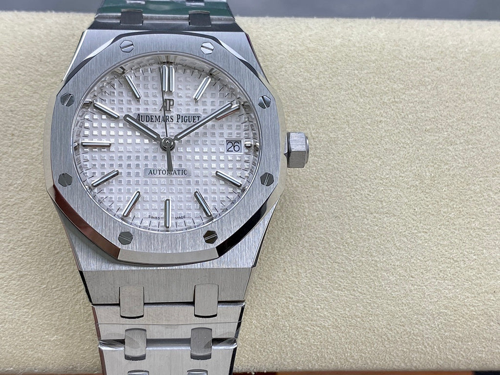 Automatic stainless-steel watch with silver dial, baton markers, and date at 3