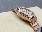 Audemars Piguet watch side profile with rose-gold case and textured dial