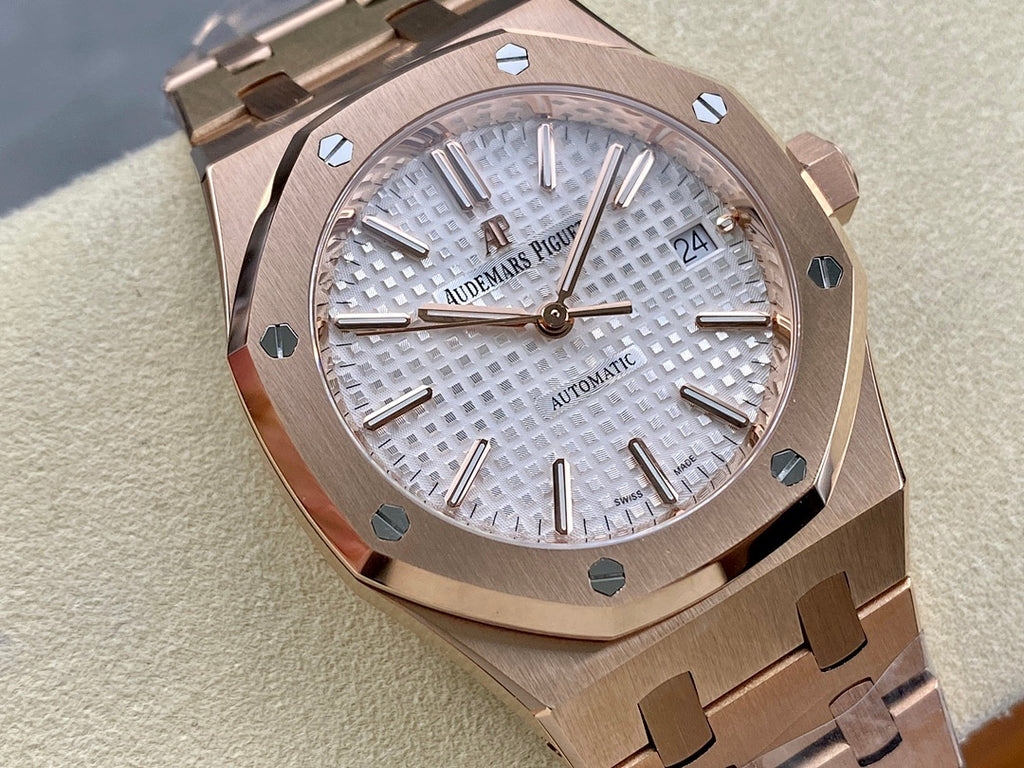 Audemars Piguet automatic watch close-up with textured silver dial and date at 24