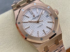 Audemars Piguet automatic watch close-up with textured silver dial and date at 24