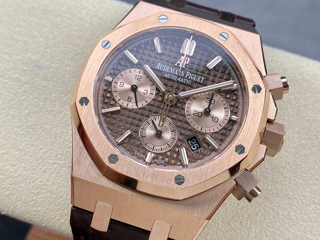Rose gold luxury chronograph watch with dark dial and leather strap, close-up front