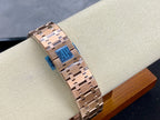 Rose-gold chronograph wristwatch bracelet with blue inner panel and AP-style clasp