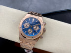 Blue dial chronograph wristwatch with rose-gold case on bracelet