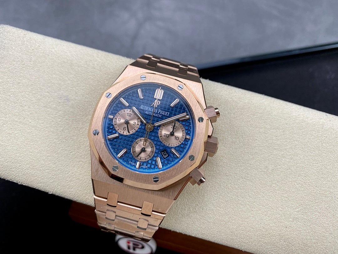 Blue dial chronograph wristwatch with rose-gold case on bracelet