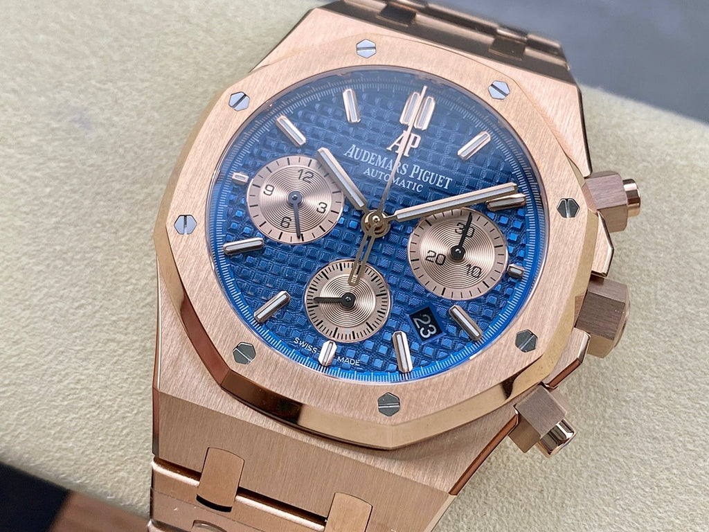 Blue dial chronograph wristwatch with rose-gold case and three subdials