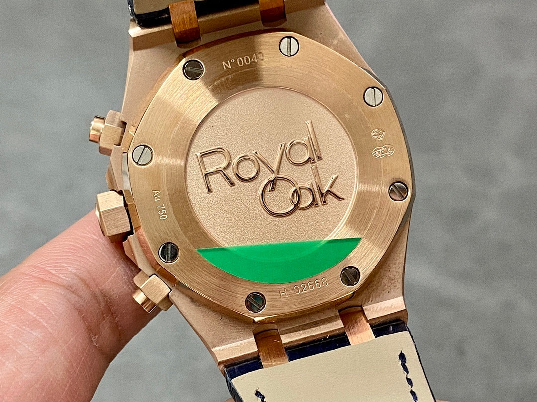 Audemars Piguet Royal Oak watch case back, gold tone with 'Royal Oak' engraving