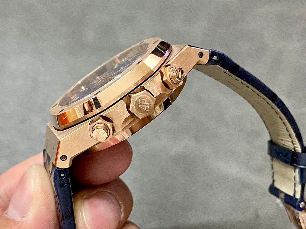 Audemars Piguet Royal Oak watch, side view with crown and pushers, blue leather strap
